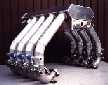 water cooled exhaust system for V-engines